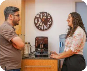 A coffee break by the espresso machine