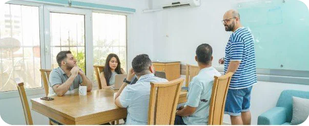 A team discussion around the meeting table